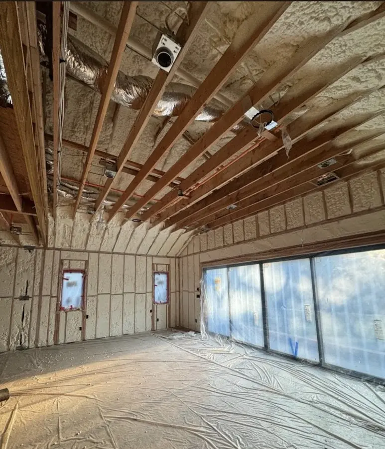 Interior walls and ceiling insulated with spray foam during new construction in Wakefield